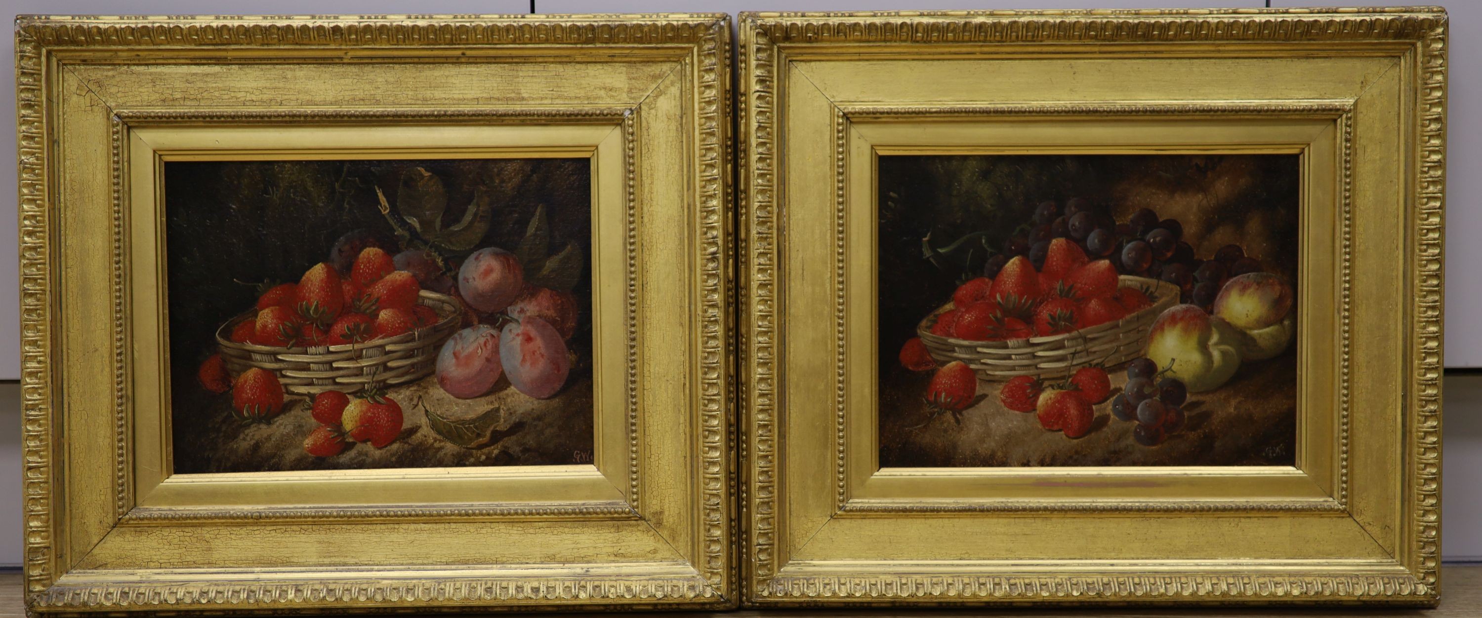 G.W - Late 19th century English school, pair of oils on canvas, Still life’s with a basket of strawberries and plums, initialled, 21 x 28cm.